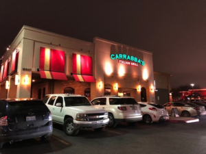 Front view of Carrabba's Grill in San Antonio at night.