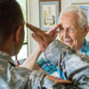 A senior saluting another military member.