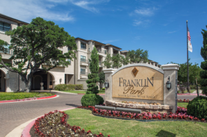 Signs and front view of the Franklin Park Sonterra senior living
